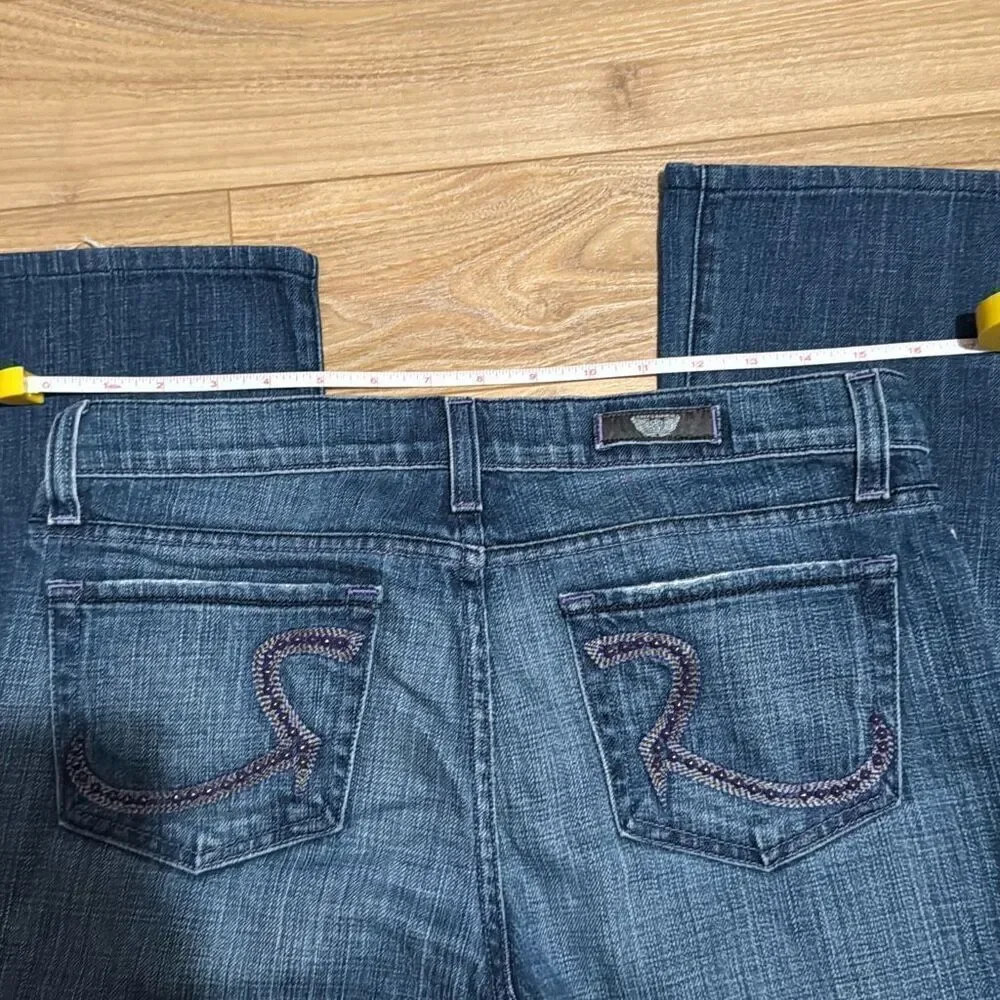 Rock & Republic Jeans Size 29 with purple studs on back and purple stitch lining